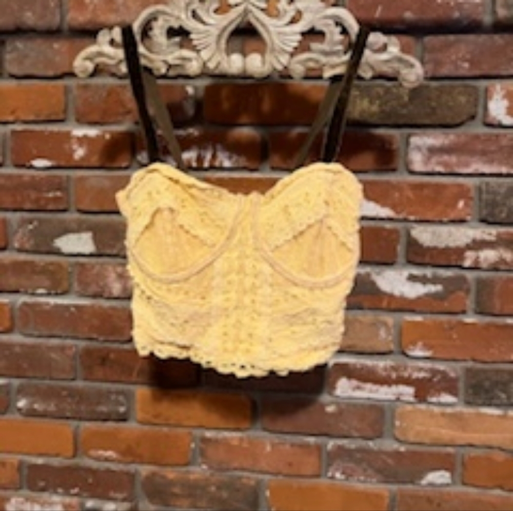 Beautiful yellow/gold bralette with non adjustable brown straps. Size M
